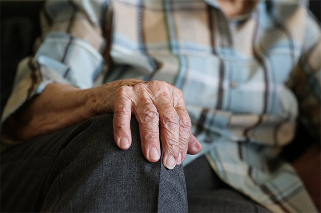 older person closeup of hand