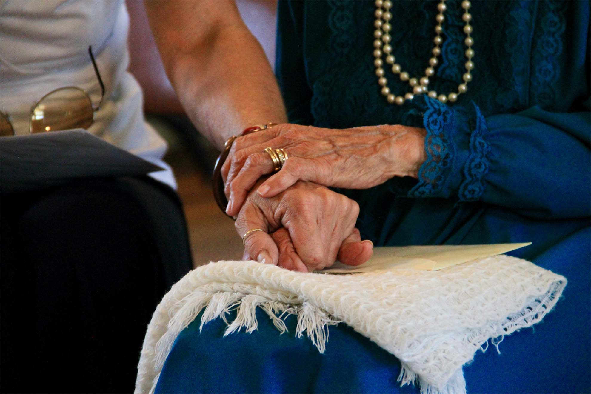 older ladies holding hands