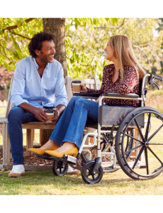 Lady in wheelchair outside