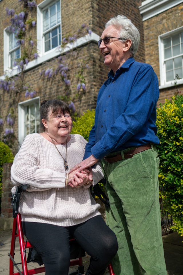 Couple outside with walking aid