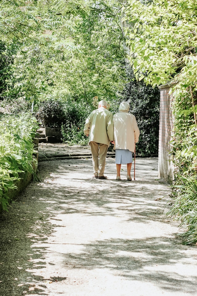 Couple walking in the garden