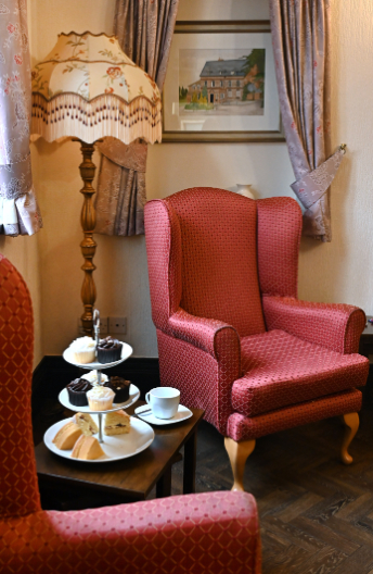 Seating area with cakes on cake stand